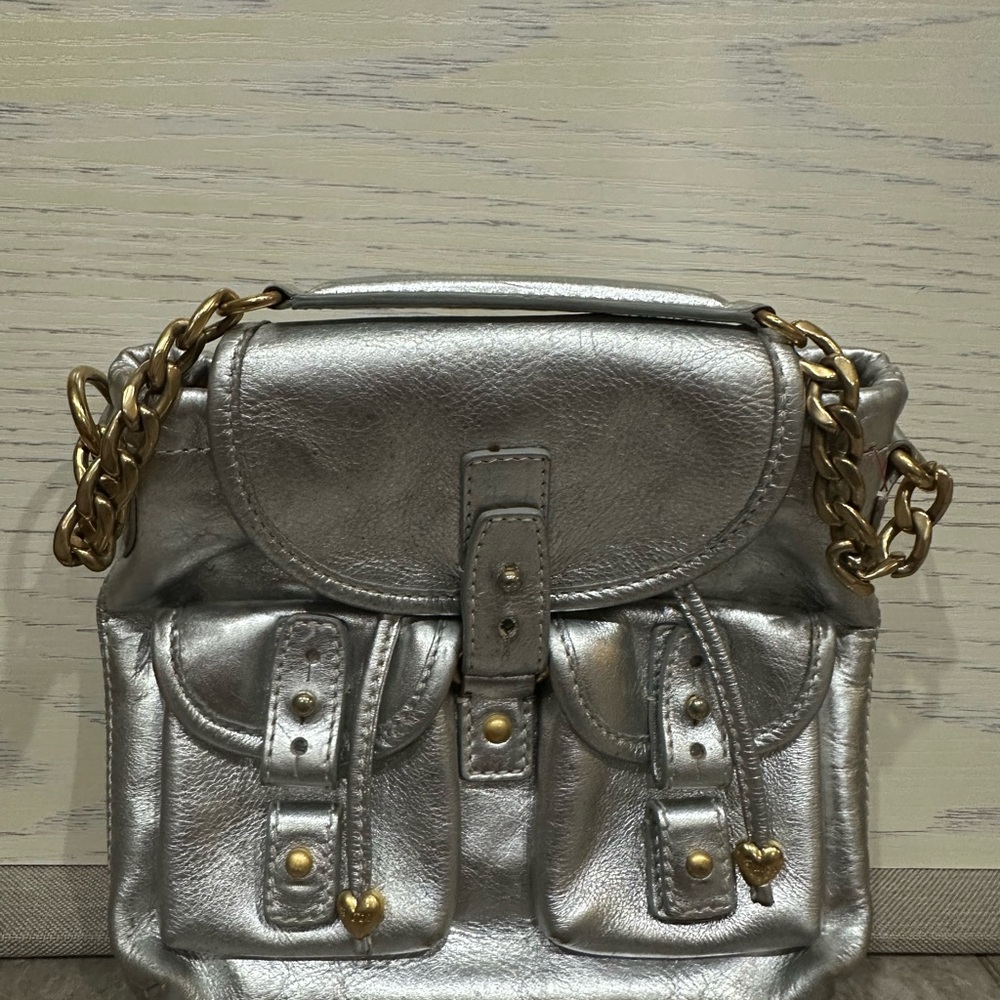 Vintage one of a kind Juicy Couture Metallic Silver Mini backpack w/Gold Chain